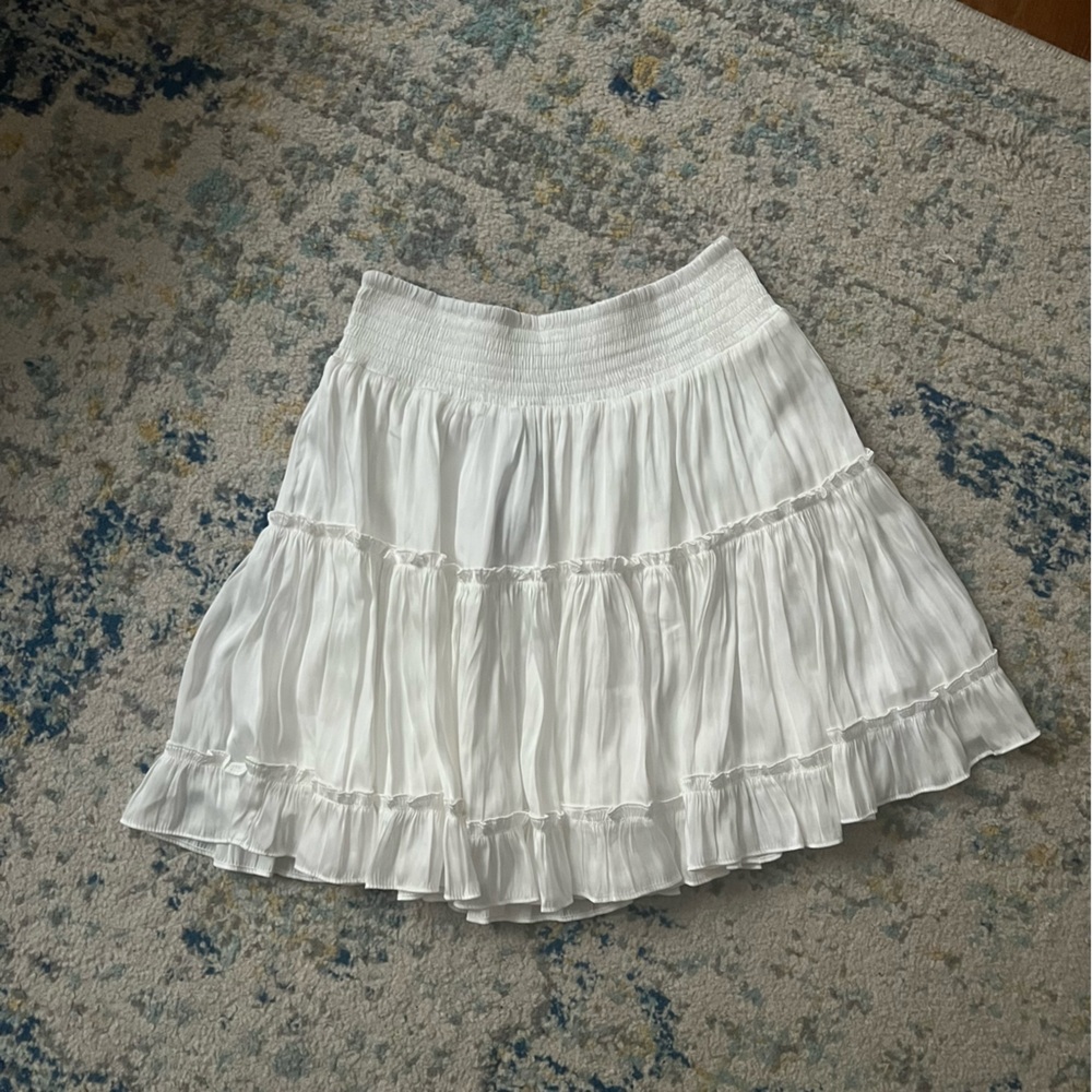 Satiny white tiered mini skirt
